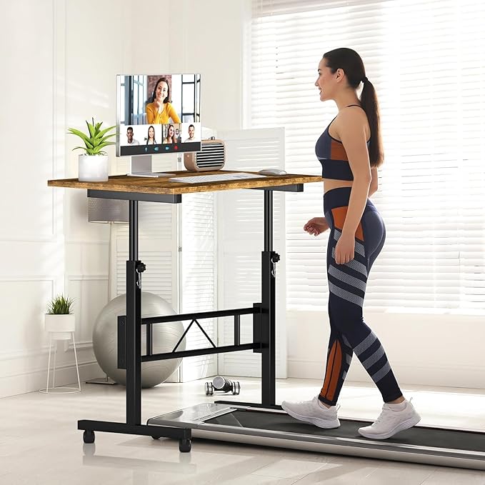Klvied Small Standing Desk Adjustable Height, Mobile Table with Wheels, Portable Laptop Table, Standing Computer Desk for Walking Pad (Brown)