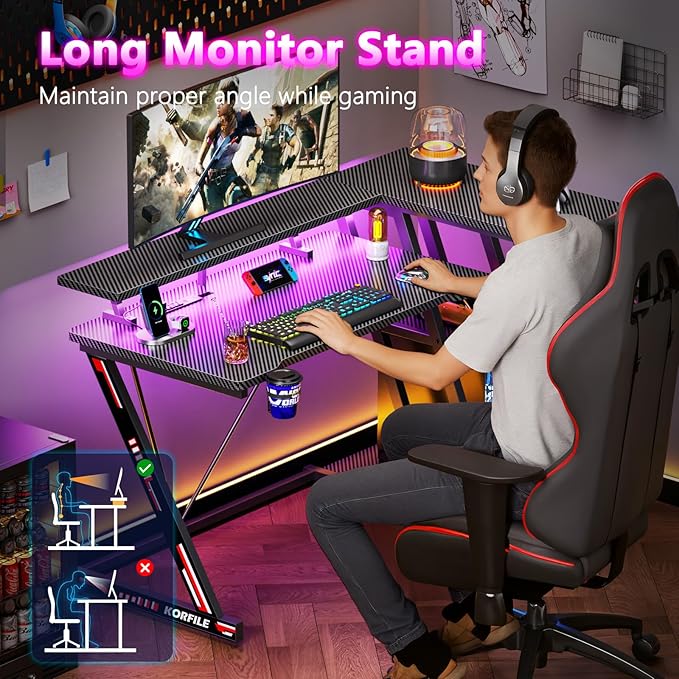 40 Inch Gaming Desk with Power Outlet & LED Lights, L Shaped Computer Gaming Table with 3 Tiers Storage Shelves, Corner Gamer Desk with Monitor Stand for Small Space, Carbon Fiber Black