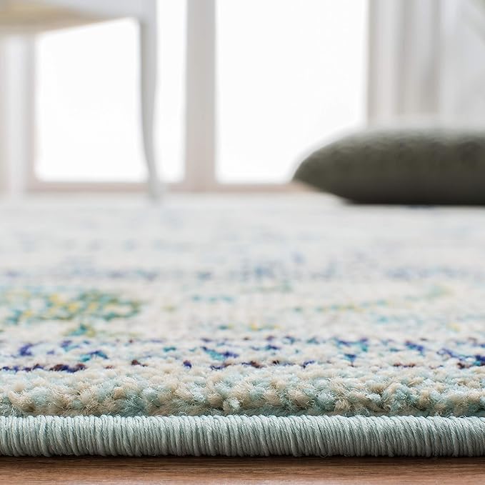 SAFAVIEH Monaco Collection Area Rug - 5'1" x 7'7", Light Blue & Ivory, Boho Chic Medallion Distressed Design, Non-Shedding & Easy Care, Ideal for High Traffic Areas in Living Room, Bedroom (MNC243K)