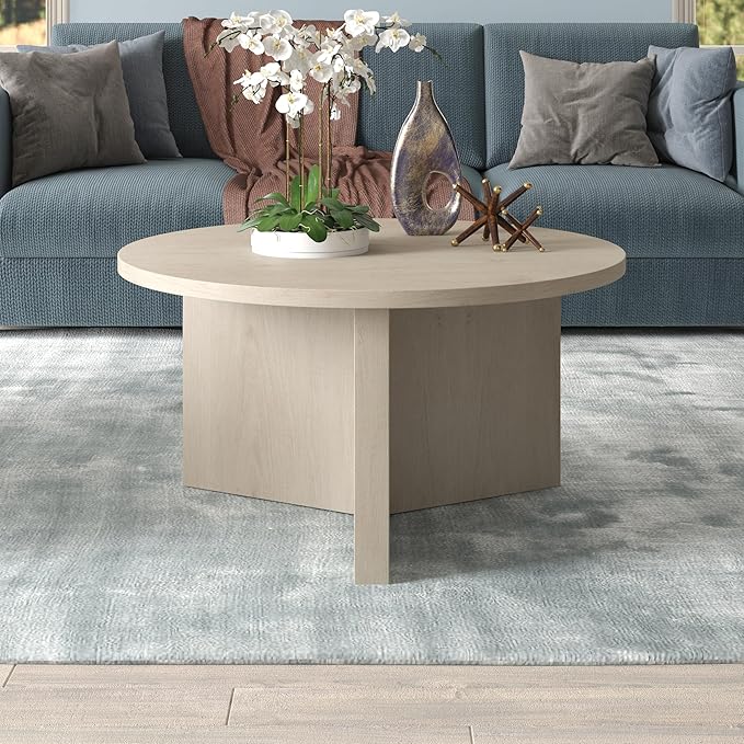 Henn&Hart 32" Round Wood Pedestal Coffee Table for Living Room, Family Room, Office, or Apartment, Alder White