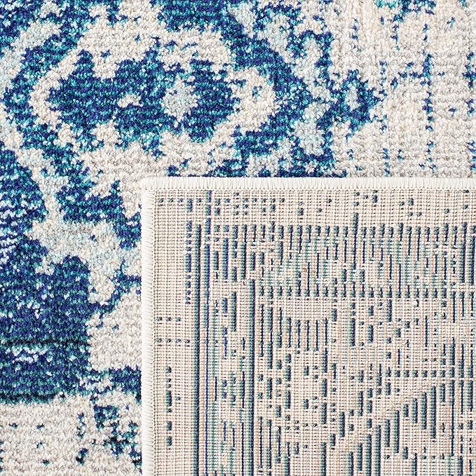 SAFAVIEH Monaco Collection Area Rug - 5'1" x 7'7", Ivory & Blue, Boho Chic Medallion Distressed Design, Non-Shedding & Easy Care, Ideal for High Traffic Areas in Living Room, Bedroom (MNC243A)