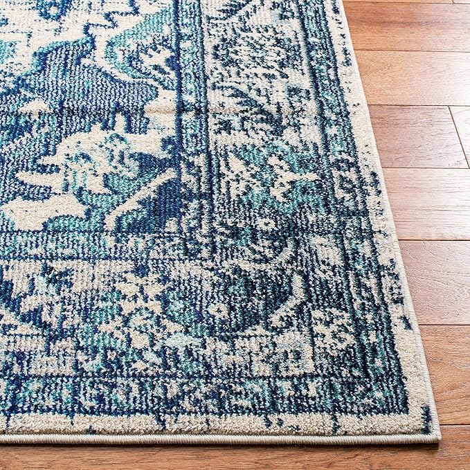 SAFAVIEH Monaco Collection Area Rug - 6'7" x 9'2", Ivory & Blue, Boho Chic Medallion Distressed Design, Non-Shedding & Easy Care, Ideal for High Traffic Areas in Living Room, Bedroom (MNC243A)