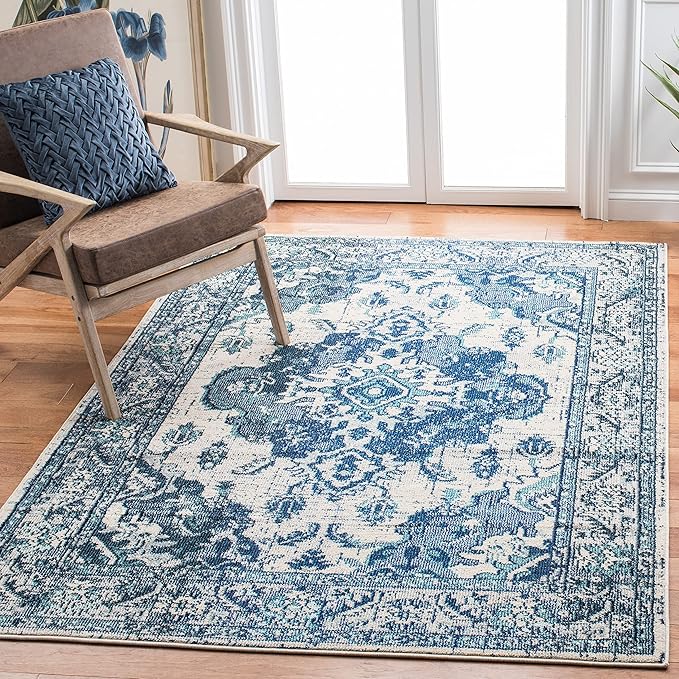 SAFAVIEH Monaco Collection Area Rug - 9' x 12', Ivory & Blue, Boho Chic Medallion Distressed Design, Non-Shedding & Easy Care, Ideal for High Traffic Areas in Living Room, Bedroom (MNC243A)